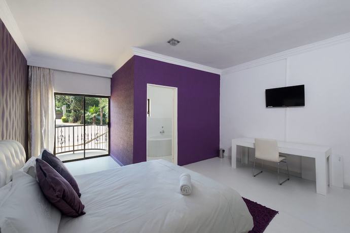 Imagen de la habitación del Hotel Disciples Boutique. Foto 11