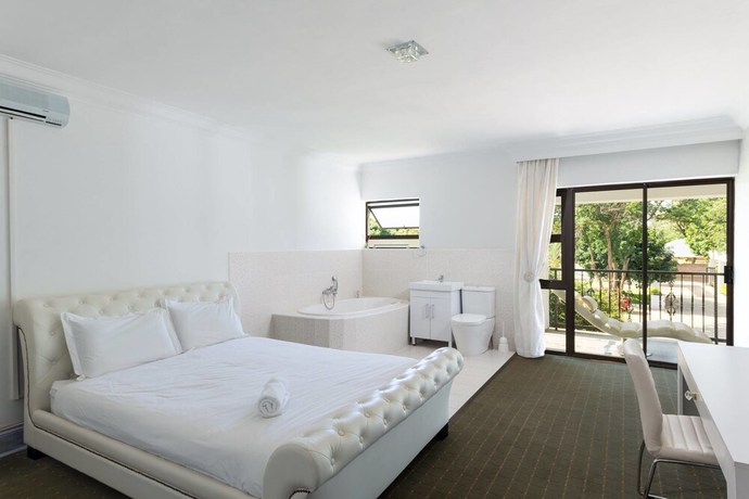 Imagen de la habitación del Hotel Disciples Boutique. Foto 15