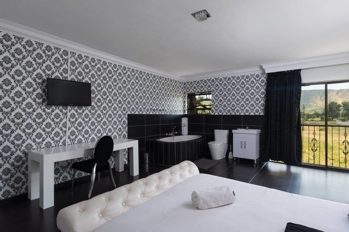 Imagen de la habitación del Hotel Disciples Boutique. Foto 18