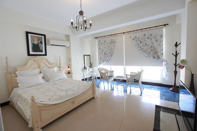 Imagen de la habitación del Hotel Discovery BandB. Foto 12