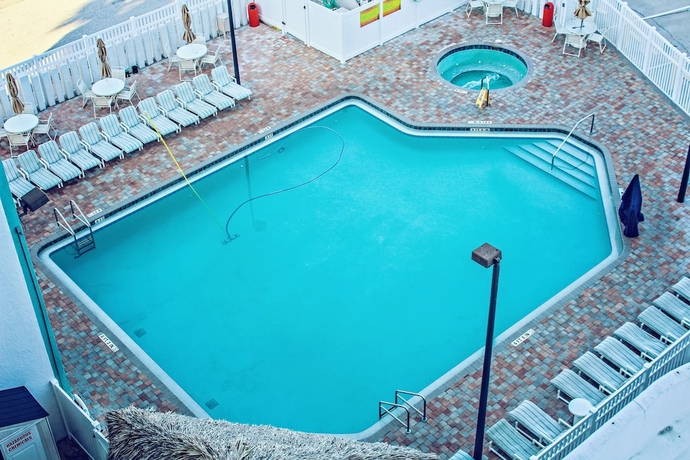 Imagen de la piscina del Hotel Discovery Beach Resort By Vri Americas. Foto 18