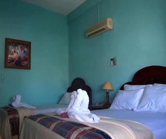 Imagen de la habitación del Hotel Discovery, Santo Domingo. Foto 16