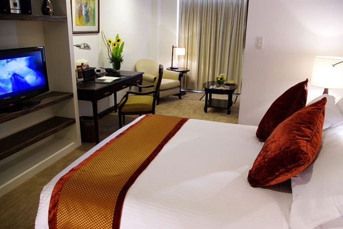 Imagen de la habitación del Hotel Discovery Suites. Foto 5