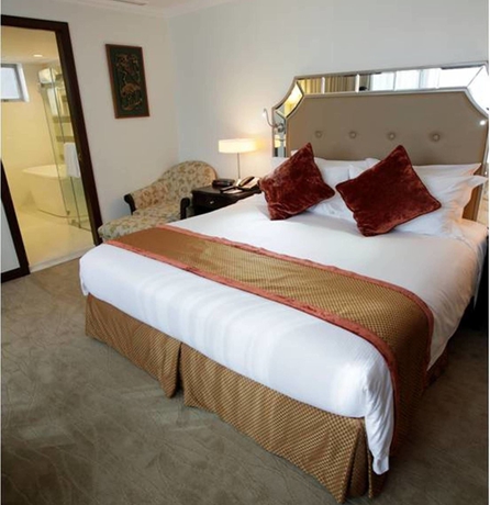 Imagen de la habitación del Hotel Discovery Suites. Foto 6