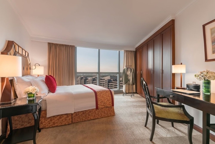 Imagen de la habitación del Hotel Discovery Suites. Foto 10