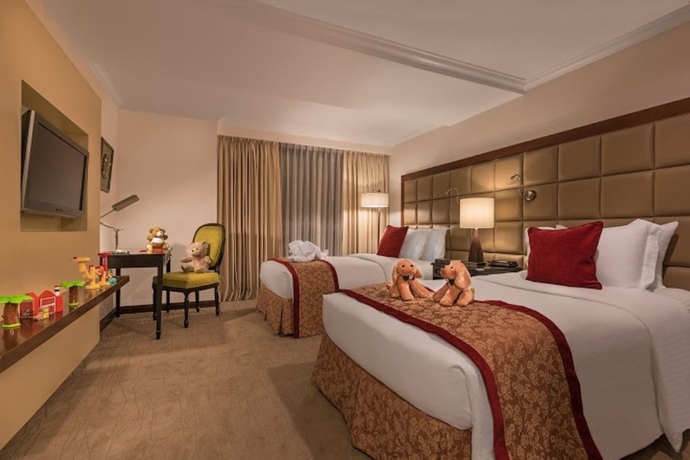 Imagen de la habitación del Hotel Discovery Suites. Foto 11