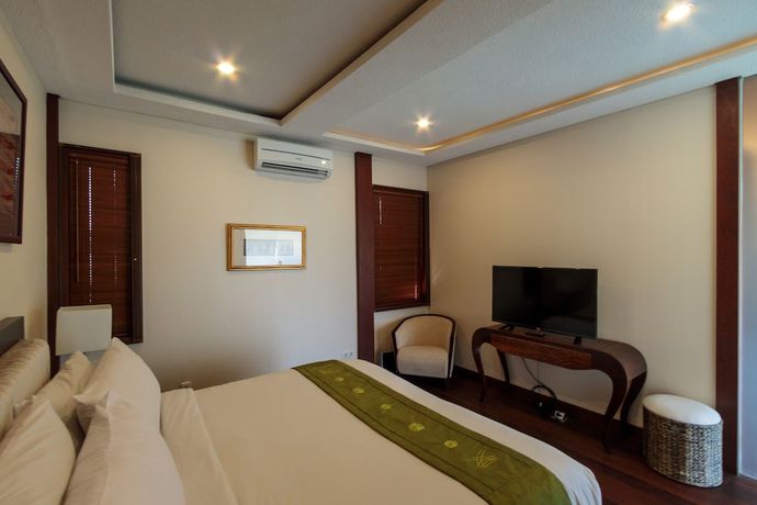 Imagen de la habitación del Hotel Disini Villa. Foto 9