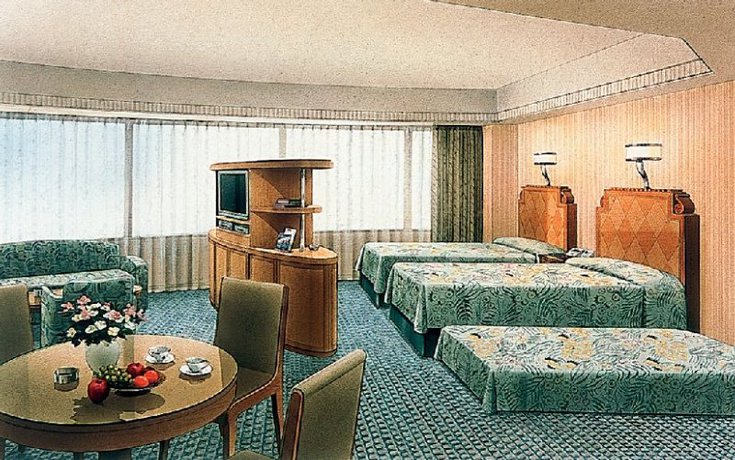 Imagen de la habitación del Hotel Disney Ambassador. Foto 5