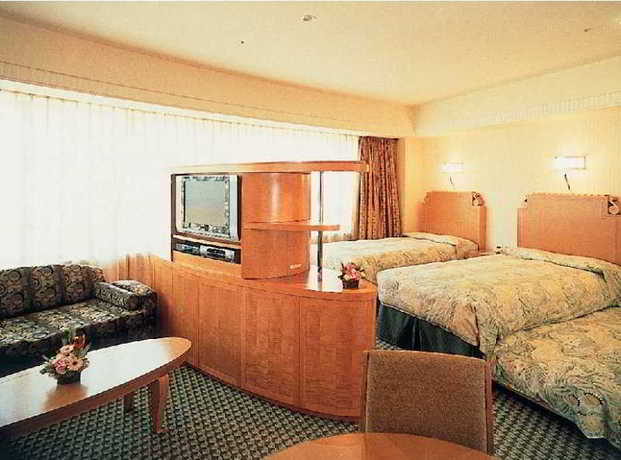Imagen de la habitación del Hotel Disney Ambassador. Foto 10
