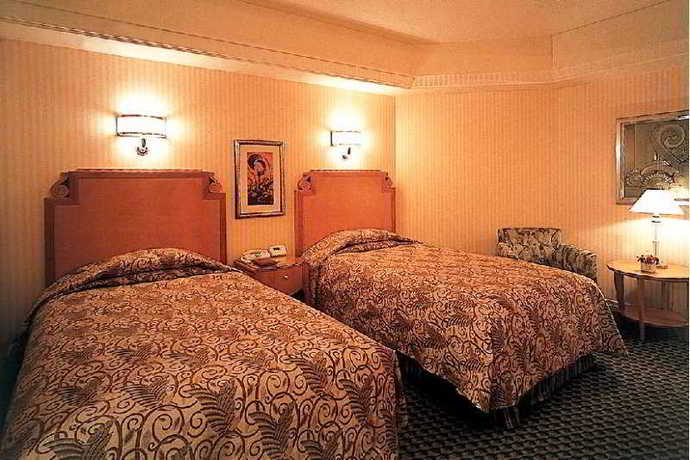 Imagen de la habitación del Hotel Disney Ambassador. Foto 12