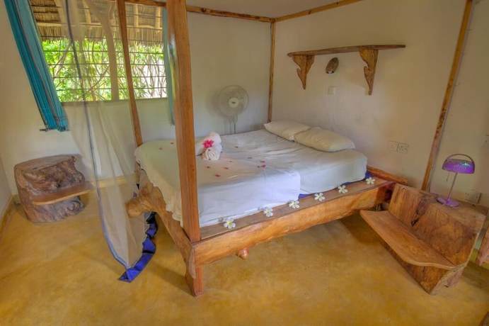 Imagen de la habitación del Hotel Distant Relatives Ecolodge and Backpackers. Foto 15