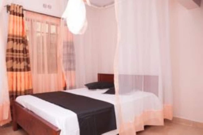 Imagen de la habitación del Hotel Distinctions Gardens Guest House. Foto 19