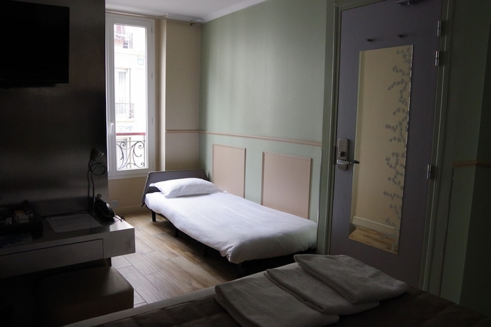 Imagen de la habitación del Hotel District Republique. Foto 10