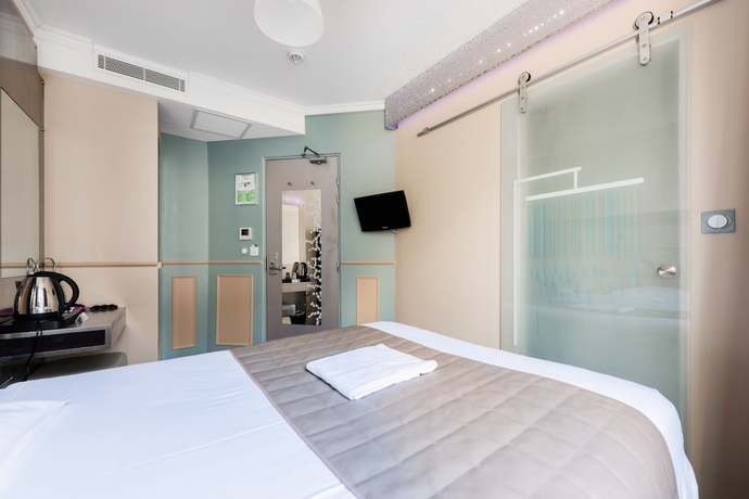 Imagen de la habitación del Hotel District Republique. Foto 12