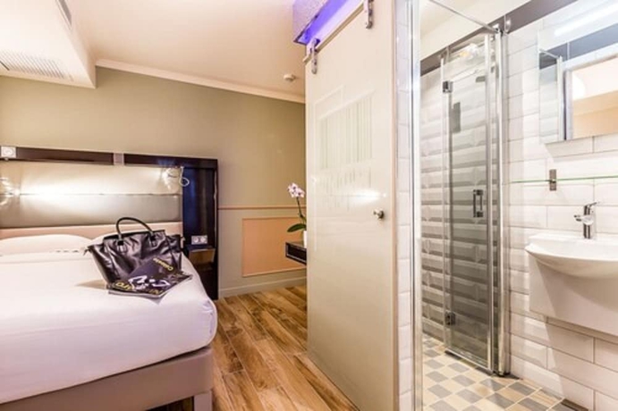 Imagen de la habitación del Hotel District Republique. Foto 15