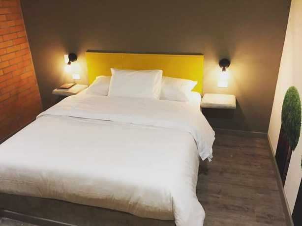 Imagen de la habitación del Hotel Distrito 21. Foto 4