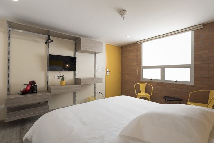 Imagen de la habitación del Hotel Distrito 21. Foto 12