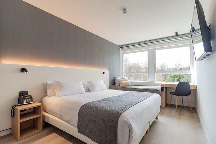 Imagen de la habitación del Hotel Distrito Oeste. Foto 7