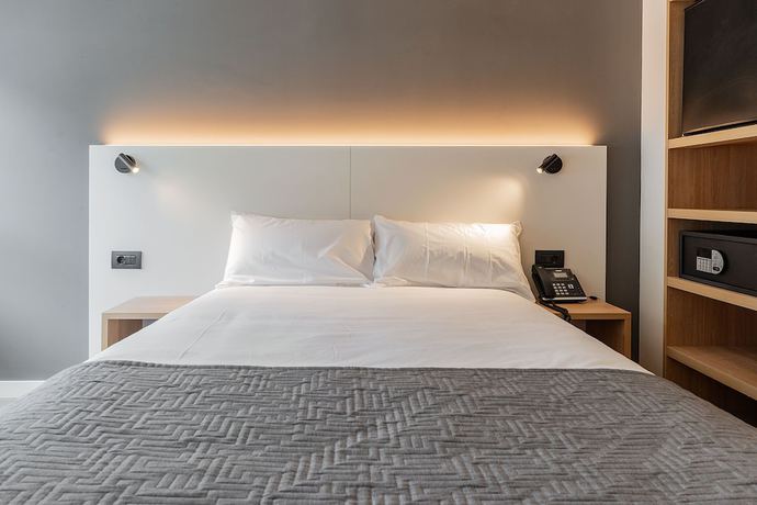 Imagen de la habitación del Hotel Distrito Oeste. Foto 10