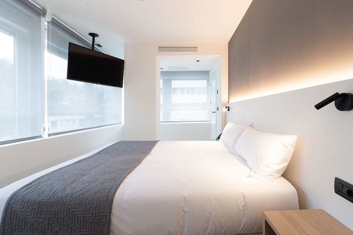 Imagen de la habitación del Hotel Distrito Oeste. Foto 11