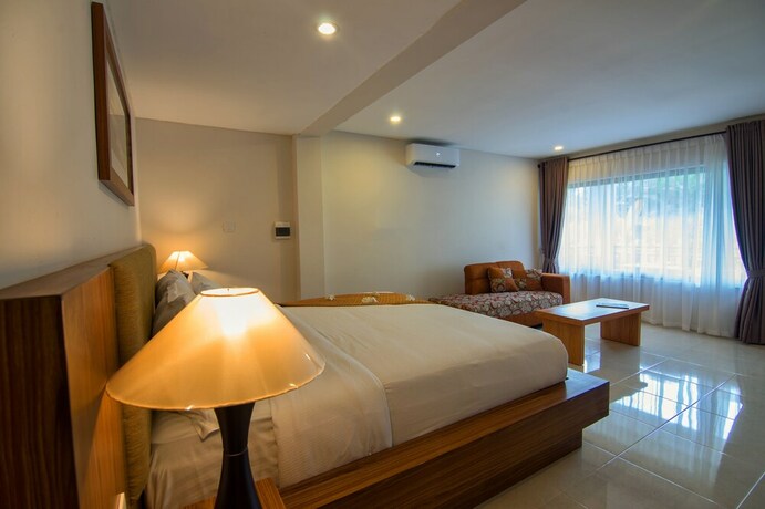 Imagen de la habitación del Hotel Diva Lombok Resort. Foto 17