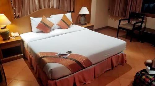 Imagen de la habitación del Hotel Diva Patong. Foto 16