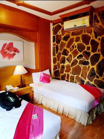 Imagen de la habitación del Hotel Diva Patong. Foto 18