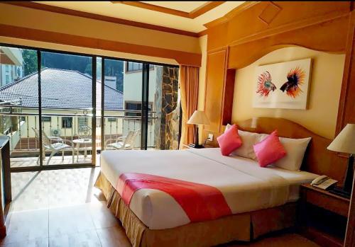 Imagen de la habitación del Hotel Diva Patong. Foto 19