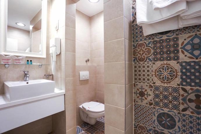 Imagen de la habitación del Hotel Divan, Sarajevo. Foto 8