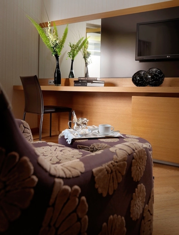 Imagen de la habitación del Hotel Divani Apollon Suites. Foto 8