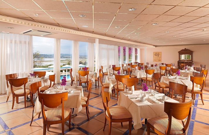 Imagen del bar/restaurante del Hotel Divani Corfu Palace. Foto 3