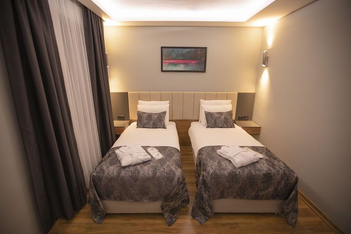 Imagen de la habitación del Hotel Divares Luxury. Foto 3