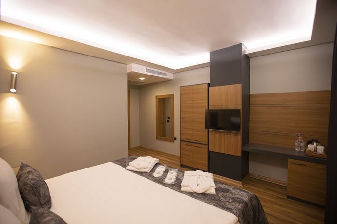 Imagen de la habitación del Hotel Divares Luxury. Foto 4