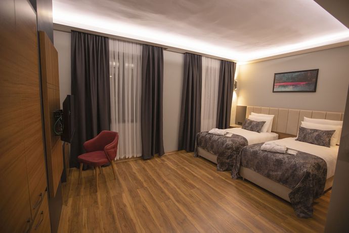 Imagen de la habitación del Hotel Divares Luxury. Foto 8