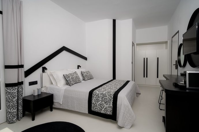 Imagen de la habitación del Hotel Divelia. Foto 9