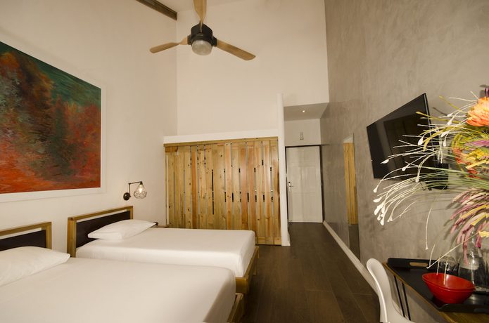 Imagen de la habitación del Hotel Divers Paradise Boutique. Foto 2