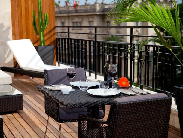 Imagen de la habitación del Hotel Divina Luxury. Foto 10