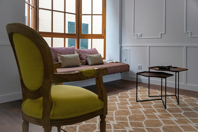 Imagen de la habitación del Hotel Divina Suites Boutique Adults Only. Foto 13