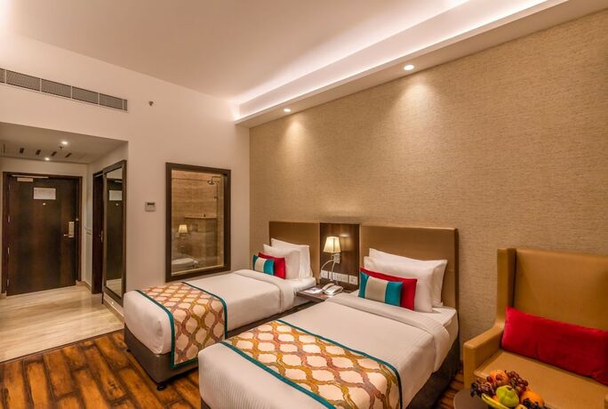 Imagen de la habitación del Hotel Divine Clarks Inn Suites. Foto 19