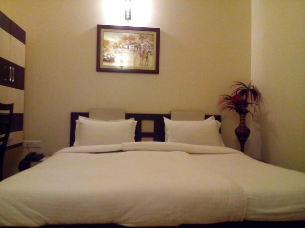 Imagen de la habitación del Hotel Divine Destination. Foto 17