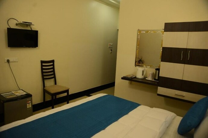 Imagen de la habitación del Hotel Divine Destination. Foto 19