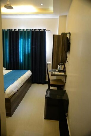 Imagen de la habitación del Hotel Divine Destination. Foto 21