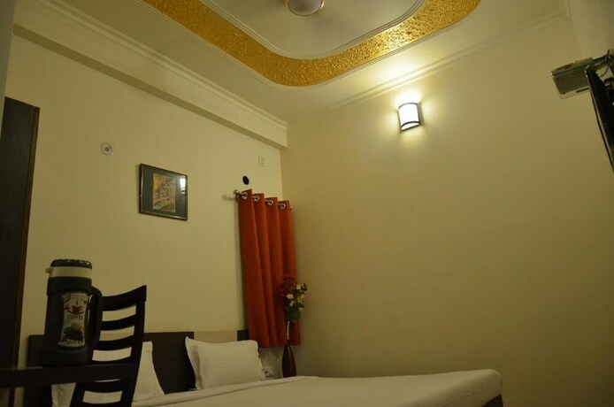 Imagen de la habitación del Hotel Divine Destination. Foto 22