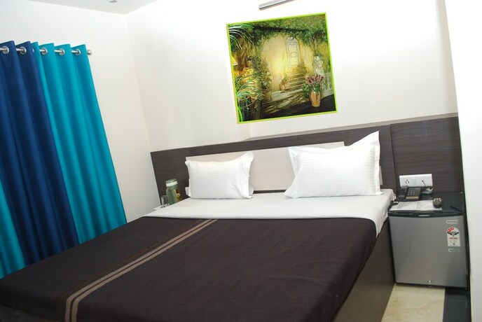 Imagen de la habitación del Hotel Divine Destination. Foto 24