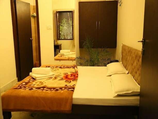 Imagen de la habitación del Hotel Divine Ganga Cottage. Foto 15