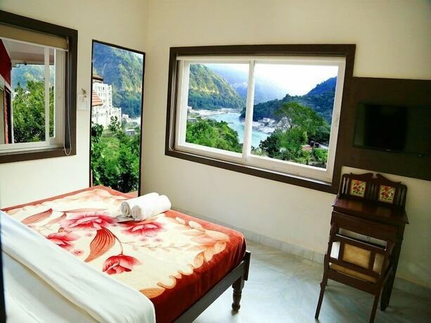 Imagen general del Hotel Divine Ganga Cottage. Foto 6