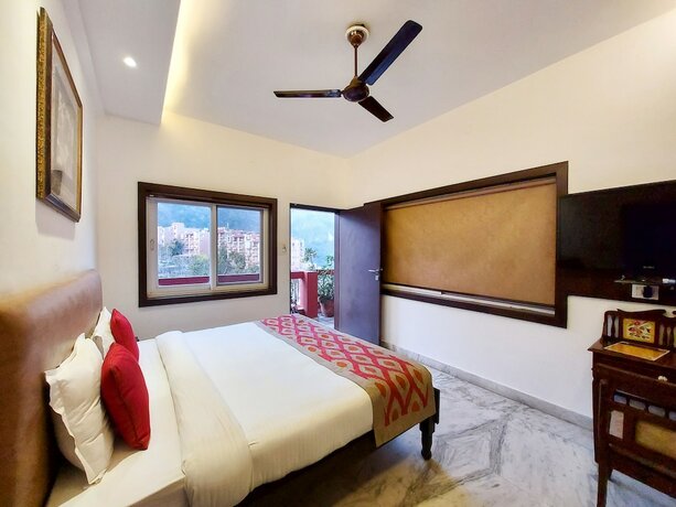 Imagen de la habitación del Hotel Divine Ganga Cottage. Foto 20
