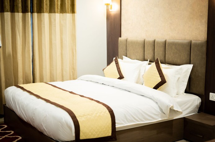 Imagen de la habitación del Hotel Divine Paradise - Dibrugarh. Foto 7