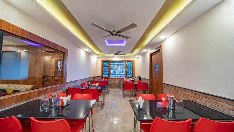 Imagen del bar/restaurante del Hotel Divine Residency. Foto 5