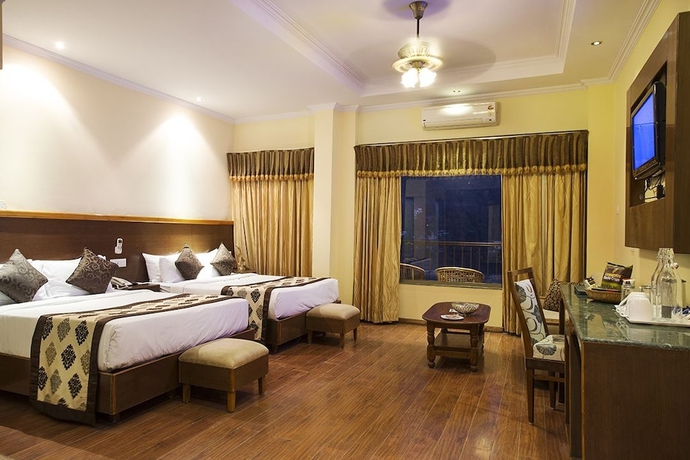 Imagen de la habitación del Hotel Divine Resort. Foto 2